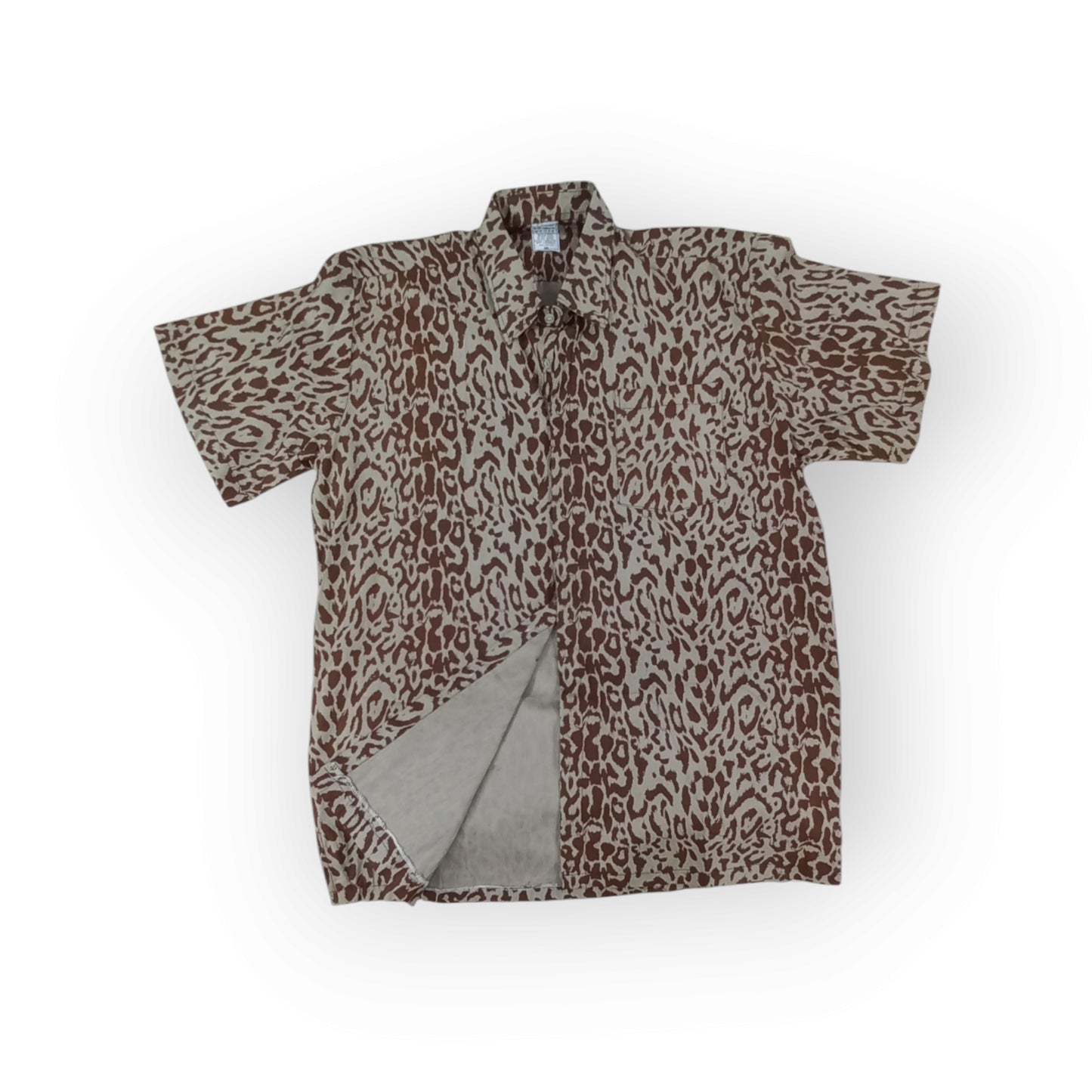 Brown and beige Rivatex cotton shirt with a repeating organic leopard pattern, perfect for a striking and comfortable outfit.