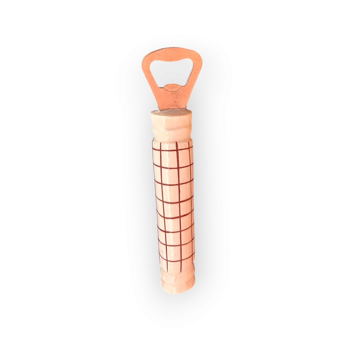 Kenyan handcrafted cow bone bottle opener with elegant grid design.