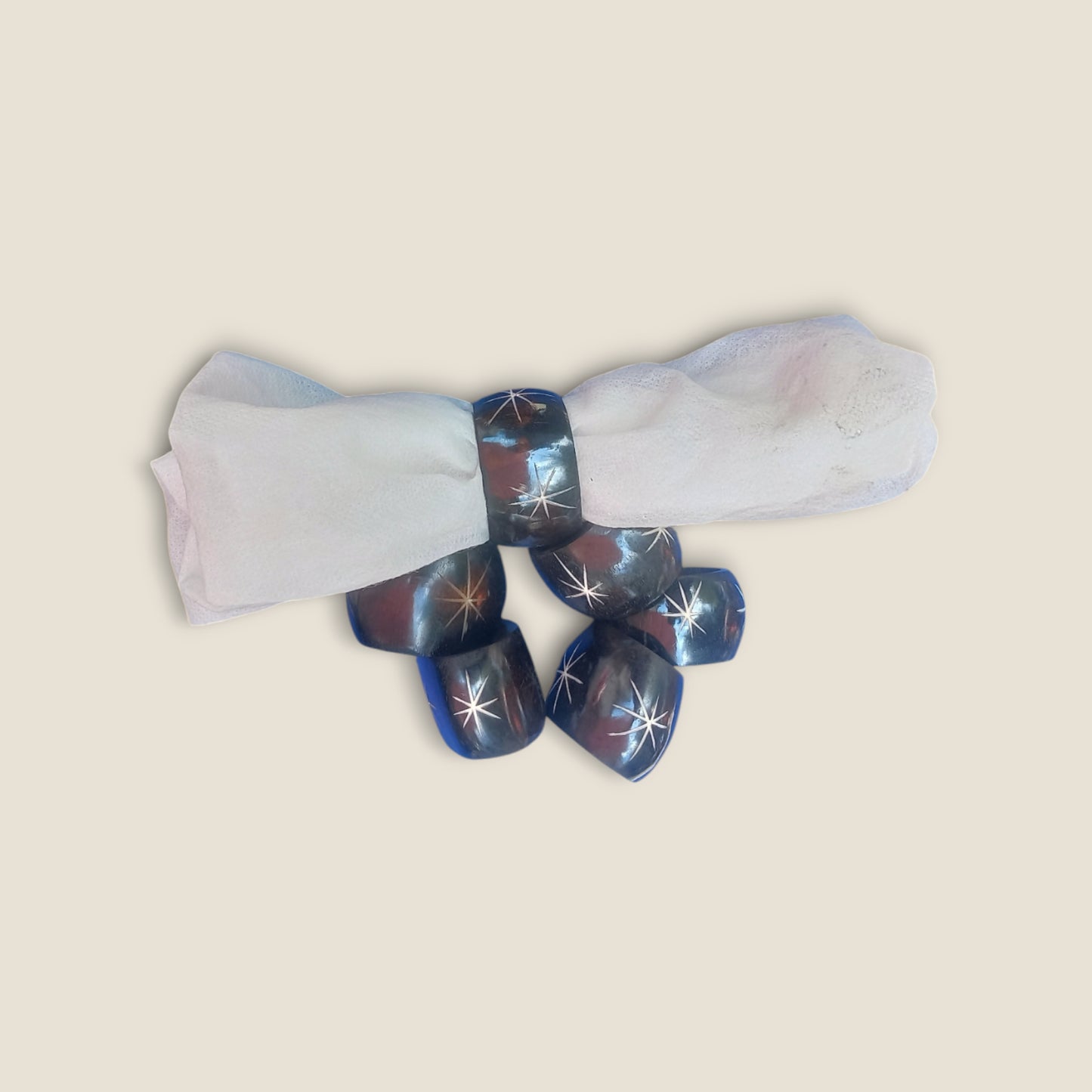 Kenyan handcrafted bone napkin rings set of 6 with unique starburst pattern