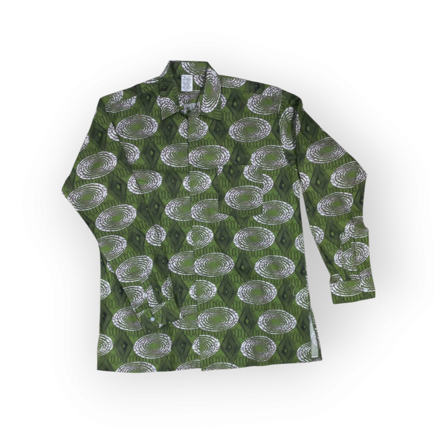 Rivatex Presidential shirt with dark green background and white oval/diamond pattern, made in Kenya.