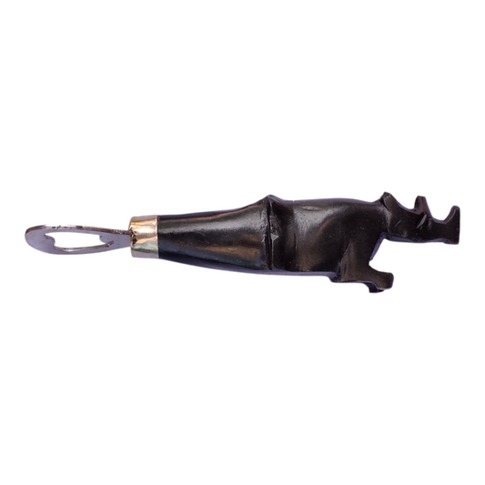 Hand-carved African ebony wood bottle opener shaped like a rhinoceros with a metal opener.
