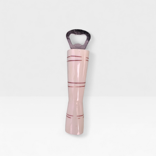 Handcrafted striped cow bone bottle opener with etched ring accents made by Kibera artisans in Kenya