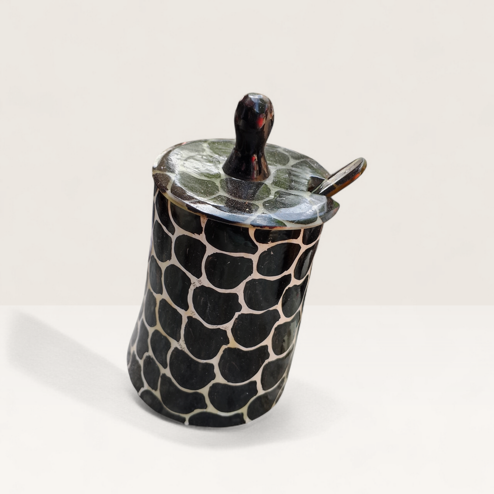 Handcrafted dark giraffe print batik pattern Kenyan cow horn sugar bowl with fitted lid and horn spoon, made in Kenya.