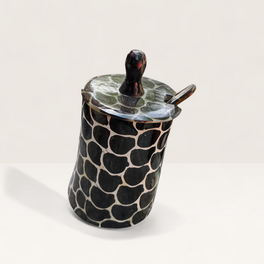 Handcrafted dark giraffe print batik pattern Kenyan cow horn sugar bowl with fitted lid and horn spoon, made in Kenya.