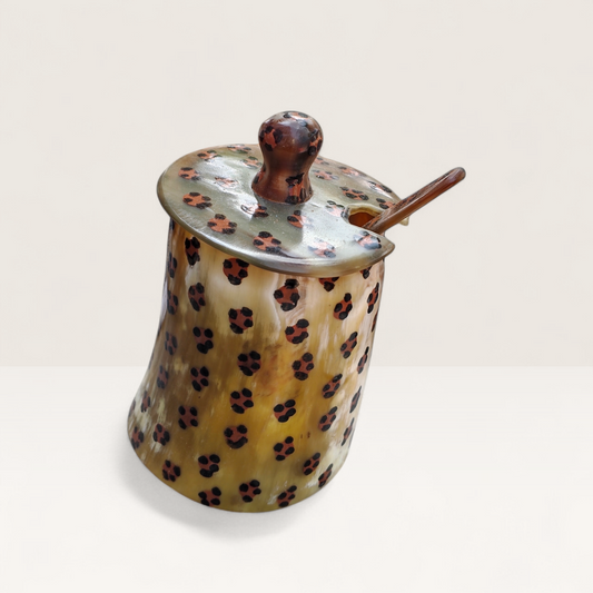 Handcrafted leopard batik pattern Kenyan cow horn sugar bowl with fitted lid and horn spoon, made in Kenya.