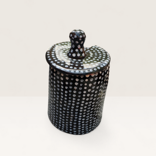 Handcrafted black and white polka dot batik pattern Kenyan cow horn sugar bowl with fitted lid and horn spoon, made in Kenya.