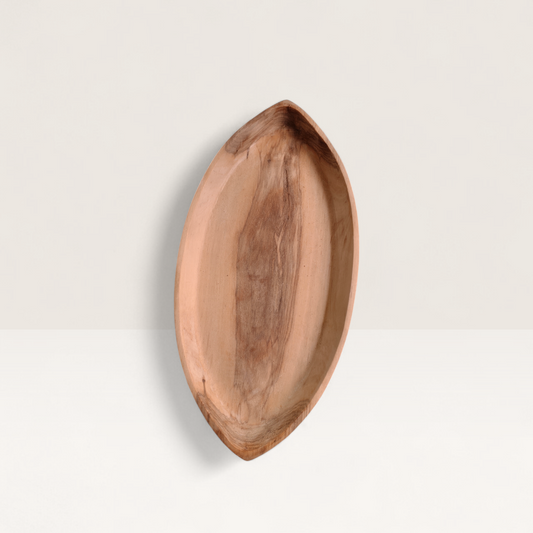 Handcrafted tapered Kenyan olive wood fish serving platter and seafood dish with natural timber grain detail, made in Ukambani Kenya.