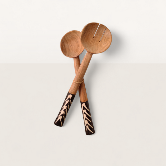 Handcrafted 2-piece Kenyan olive wood salad serving spoons with dark chevron batik bone handles, made in Ukambani Kenya.