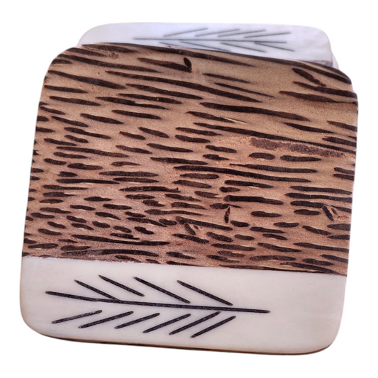 Handcrafted square Kenyan coconut wood coaster set of 4 with leaf motif batik bone inlay edge, made in Ukambani Kenya.