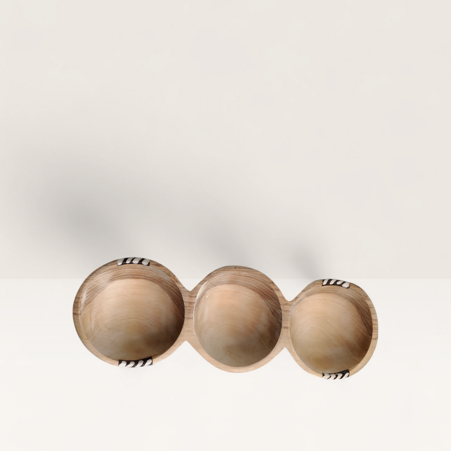 Hand-carved 3-compartment olive wood serving bowl with batik bone inlay on the rims, crafted in Kenya