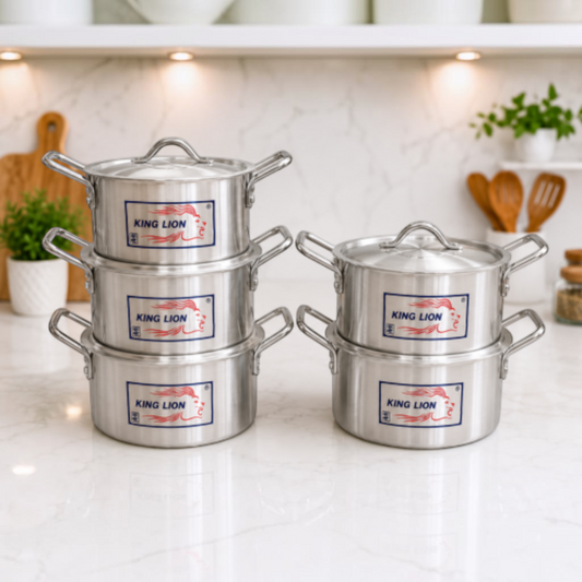 King Lion 5 piece chrome hi casserole polished aluminium sufuria set 3L 4L 5L 7L 9L with lids arranged on a white marble kitchen counter
