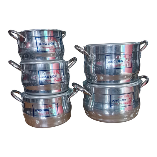 King Lion 5 piece polished aluminium diamond belly casserole sufuria set stacked in two piles on a wooden store counter manufactured by Kaluworks