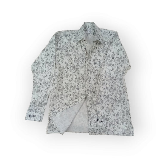  Rivatex long-sleeve shirt with a white background and intricate dark grey abstract vine pattern, made in Kenya.