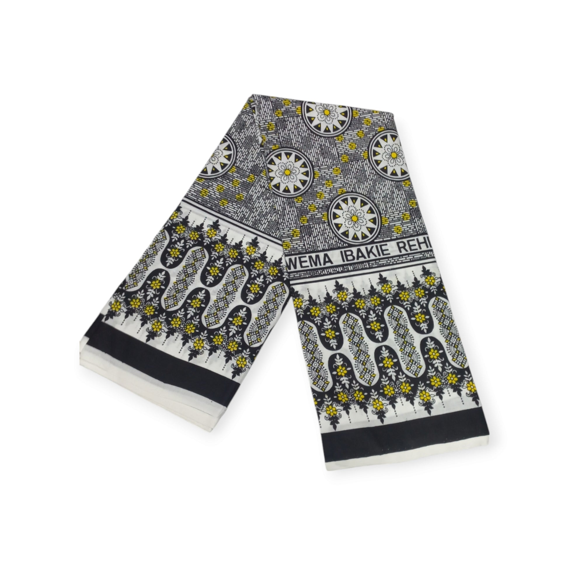 Pair of white cotton lesos from Rivatex, featuring a bold black and yellow geometric pattern.

