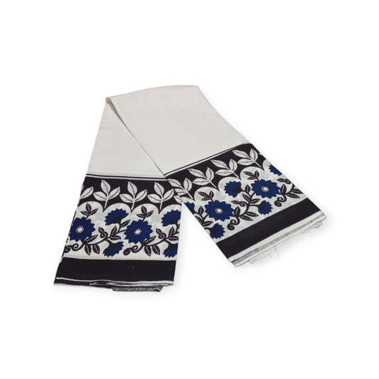 Pair of white cotton lesos from Rivatex, featuring a delicate blue and black floral border.
