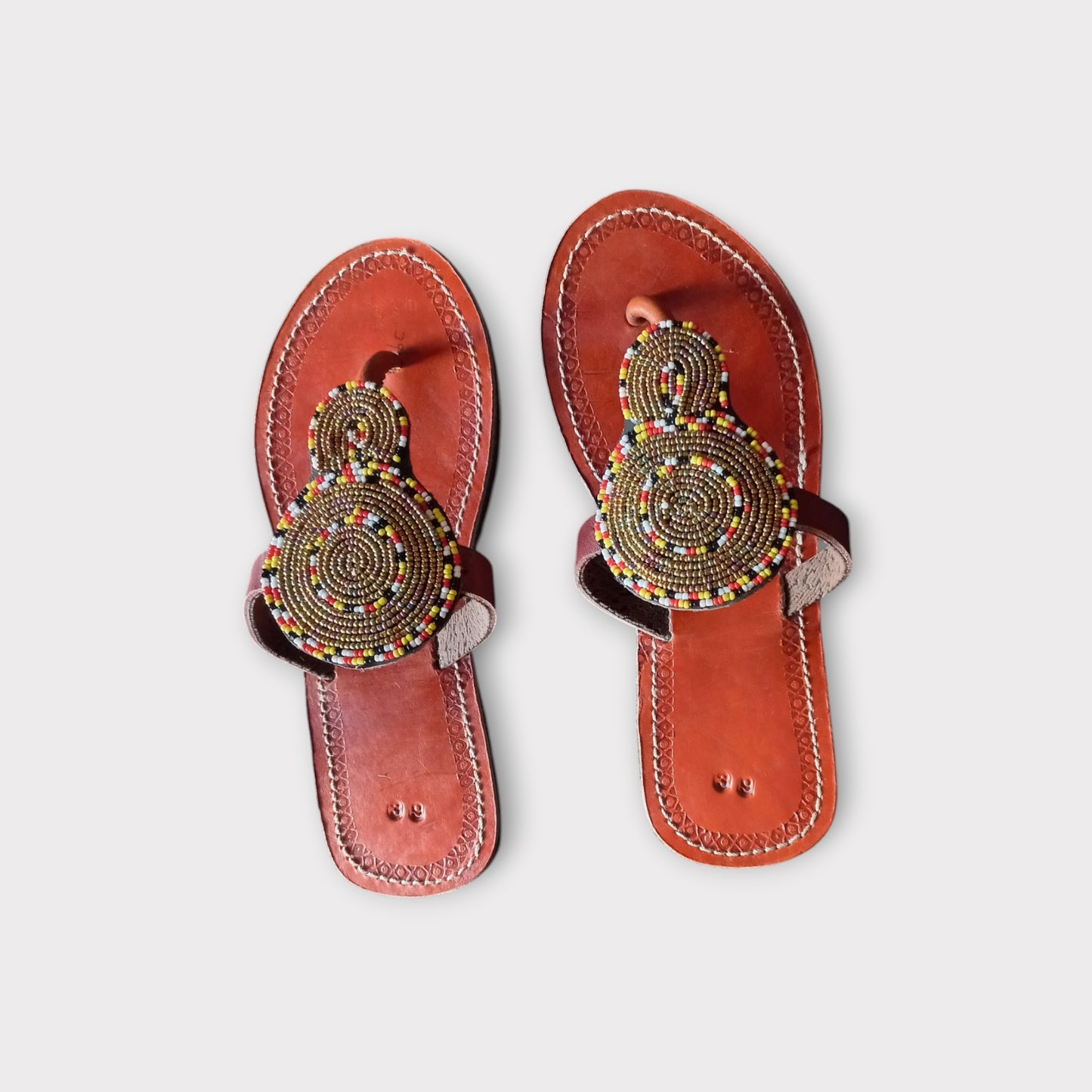 Handcrafted Maasai sandals with intricate beadwork


