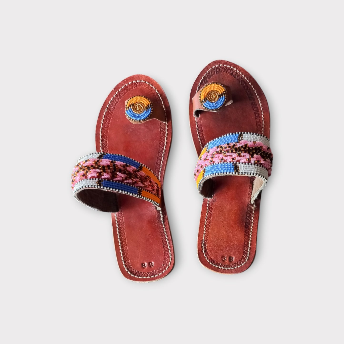 a pair of handmade toe-ring maasai sandals 