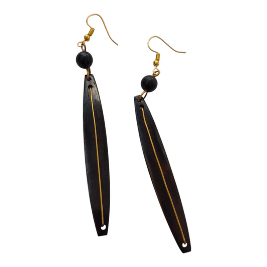 NuaLocal handcrafted dark ebony bone needle drop earrings with inline gold-tone brass wire inlay and black accent bead, made in Kibera, Nairobi, Kenya.