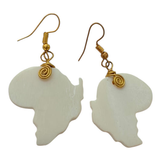 NuaLocal handcrafted off-white upcycled bone Africa map outline drop earrings with brass wire coils, ethically made in Kibera, Nairobi, Kenya.