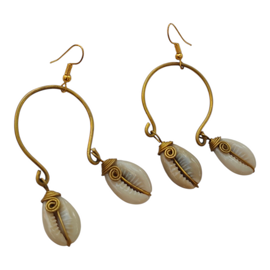 NuaLocal handcrafted golden brass horseshoe arch open hoop drop earrings with two wire-wrapped natural cowrie shells, made in Kibera, Nairobi, Kenya.