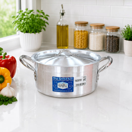 Nualocal Kaluworks Pardini 704 series silver aluminium casserole pot with lid on a white kitchen countertop