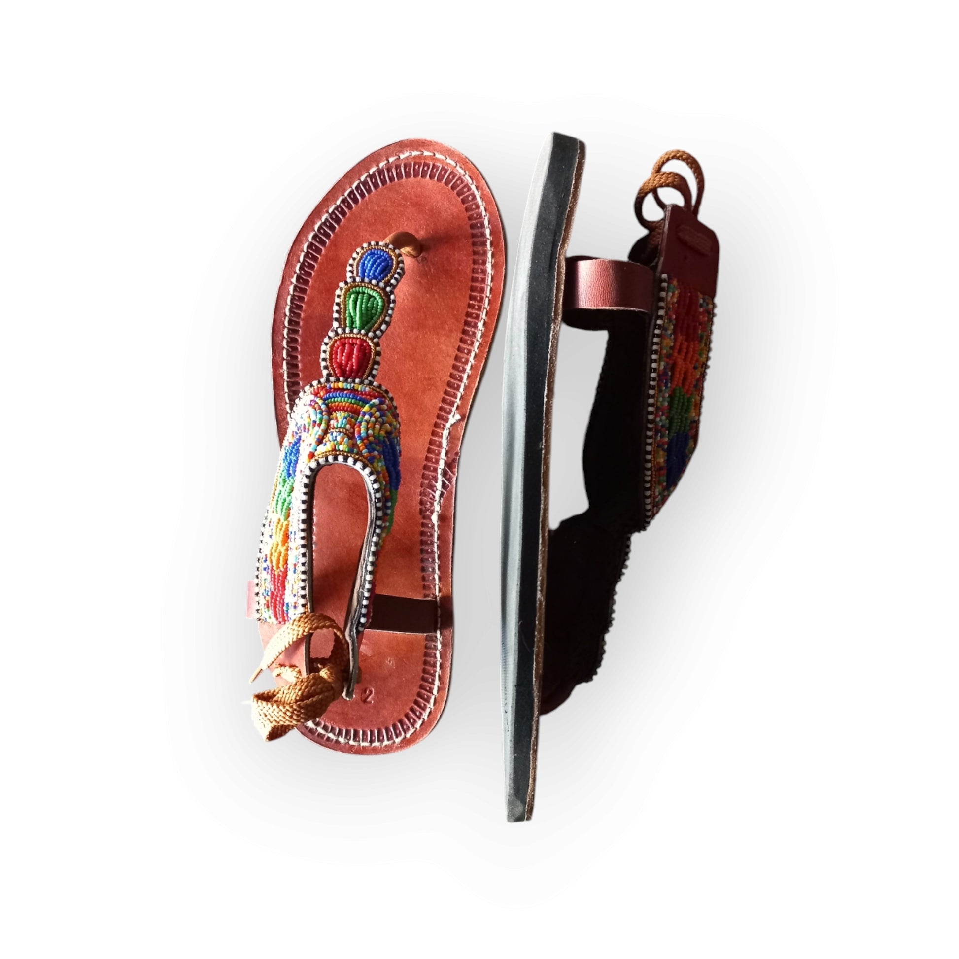 Pair of Maasai leather sandals with colorful beadwork
