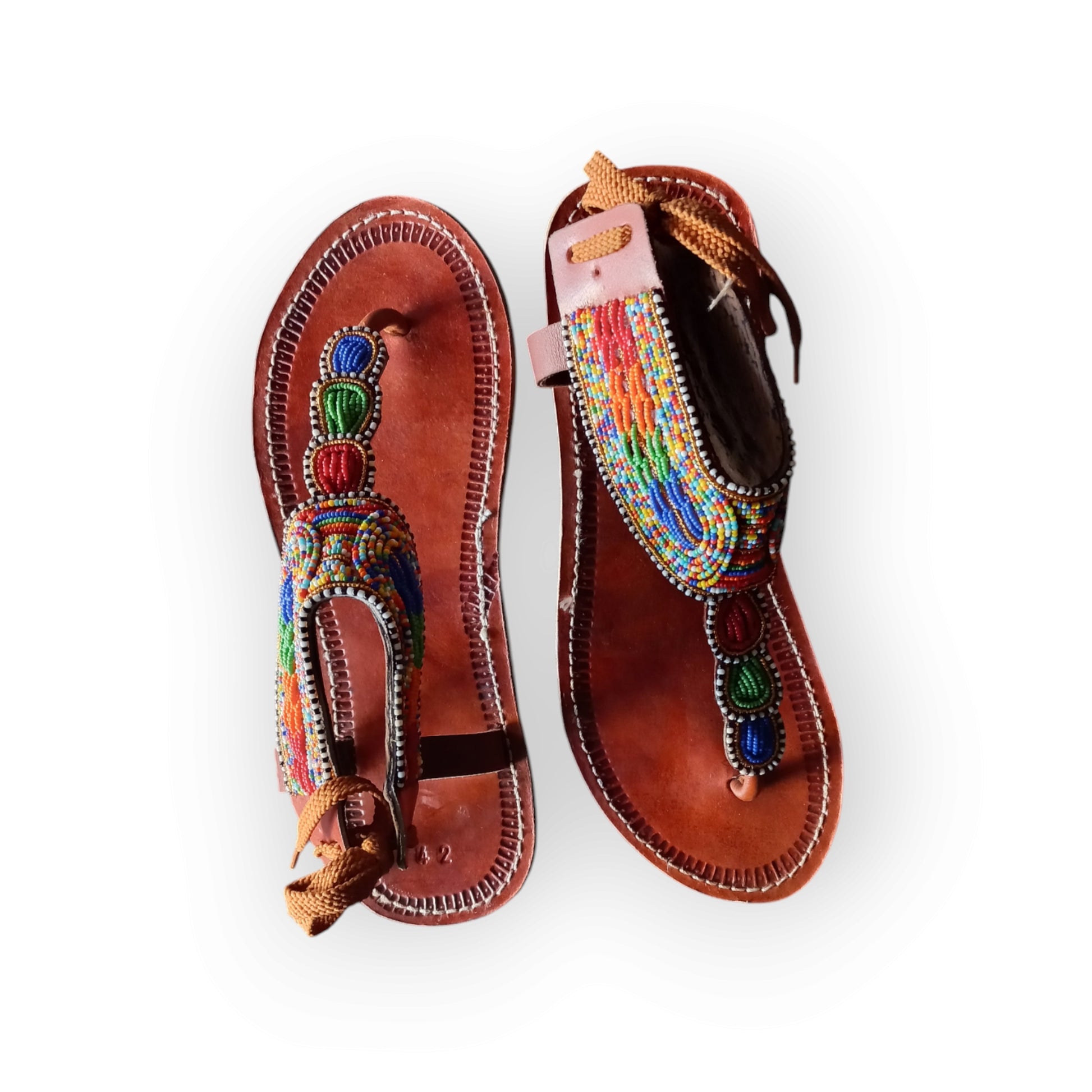 Pair of Maasai leather sandals with colorful beadwork
