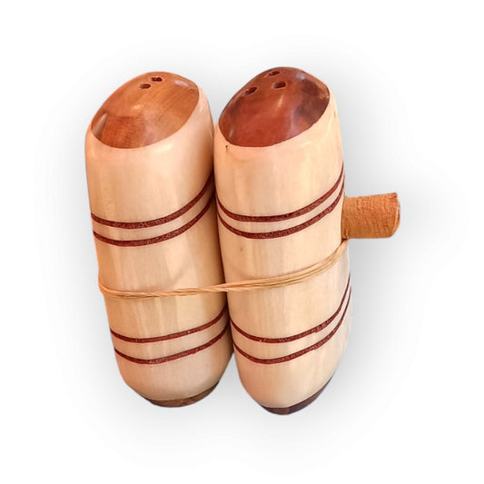Kenyan camel bone salt and pepper shakers set with striped design and unique side plug, handcrafted from natural materials