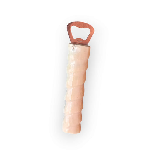 Kenyan handcrafted bone bottle opener with a unique segmented design