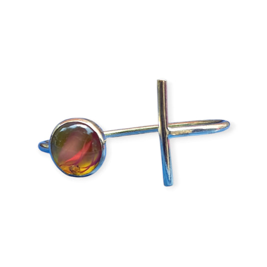 Unique Kenyan brass cuff bracelet with a modern, minimalist aesthetic, adorned with a captivating amber ornament.