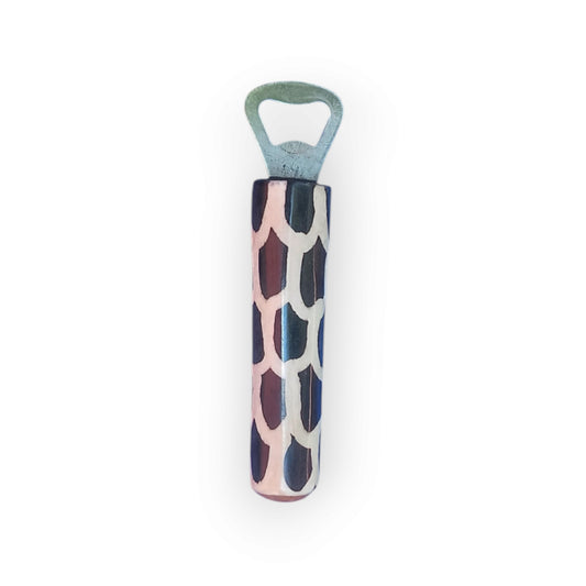 Kenyan handcrafted bone bottle opener with unique giraffe print design.