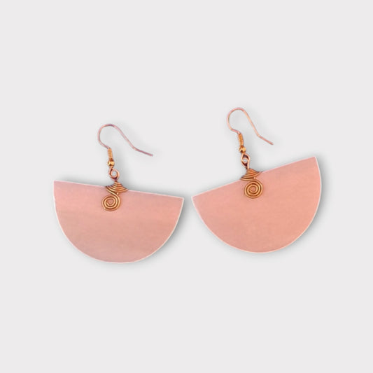 Elegant Kenyan-made earrings showcasing the natural beauty of smooth, semi-circular bone.