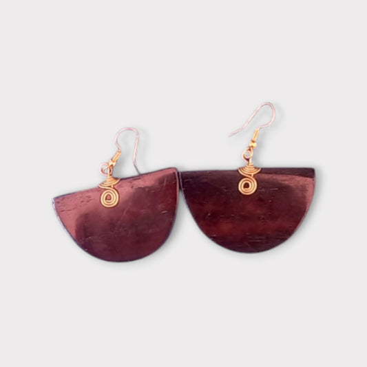 Beautiful Kenyan-made earrings showcasing the natural beauty of smooth, semi-circular bone with a wood-like appearance.