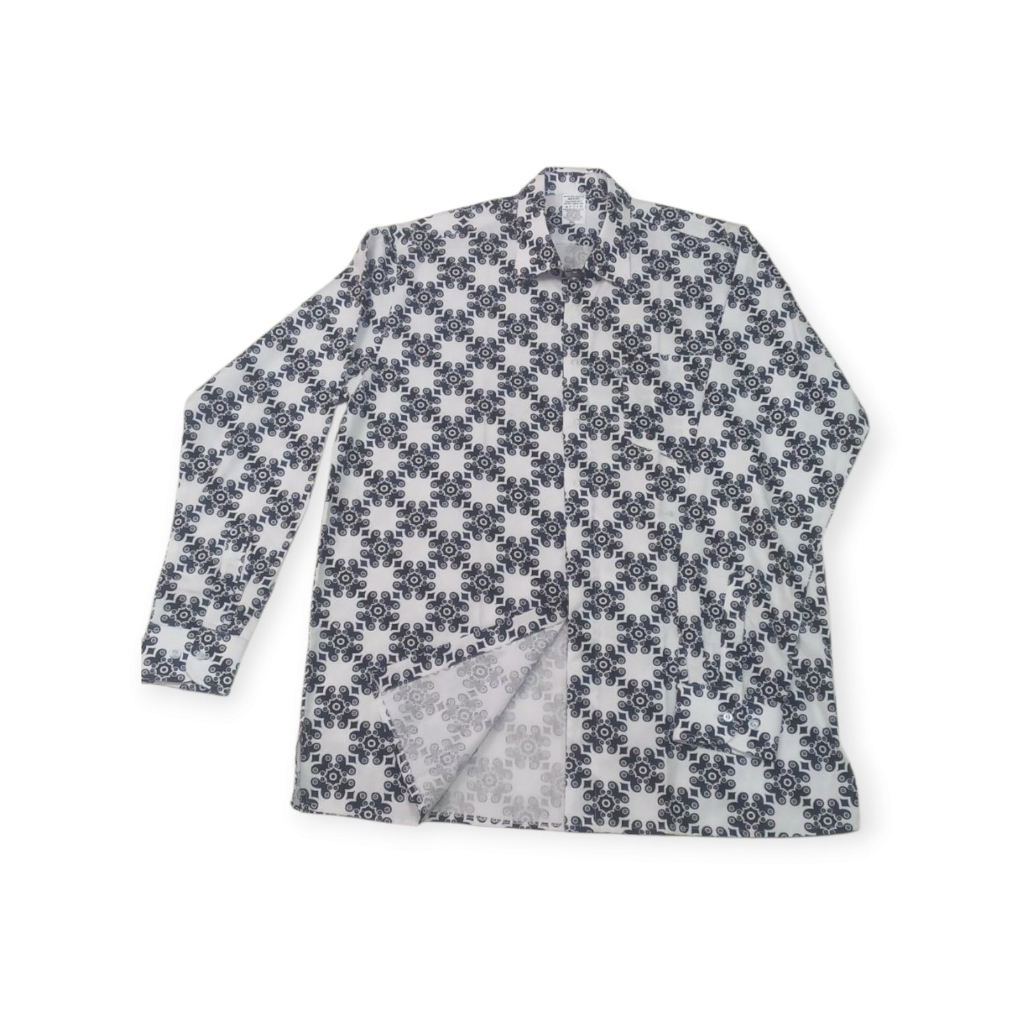 Rivatex Presidential long-sleeve shirt with a white background and subtle dark grey floral pattern, made in Kenya.