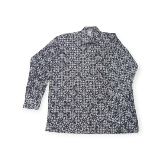 Stylish long-sleeved cotton button-down 'Uhuru' shirt made in Kenya by Rivatex, with a detailed abstract geometric design.