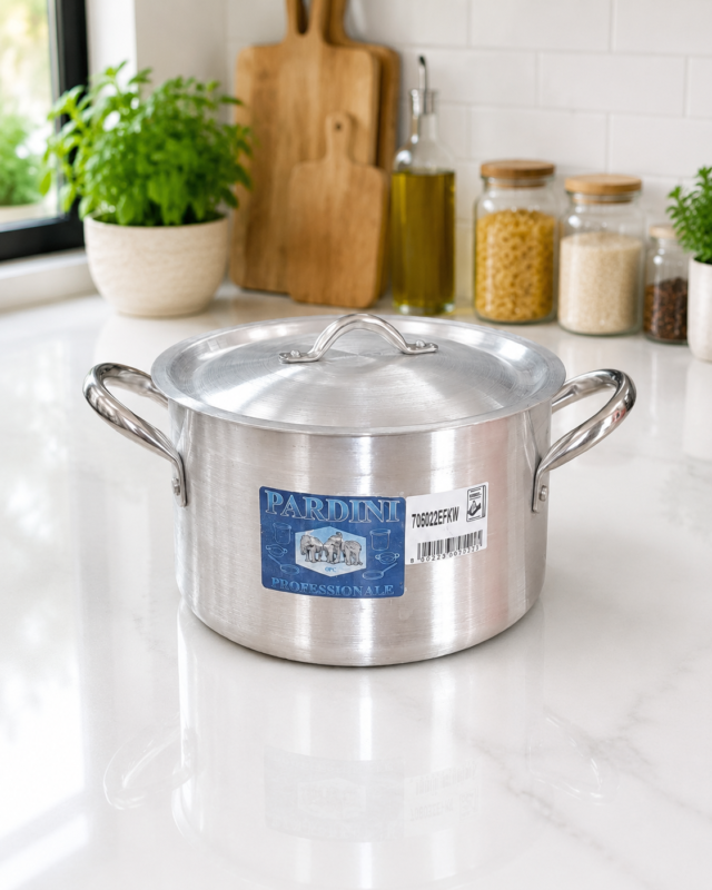 Pardini Professional deep height aluminium casserole sufuria with stainless steel handles and lid manufactured by Kaluworks on a kitchen counter