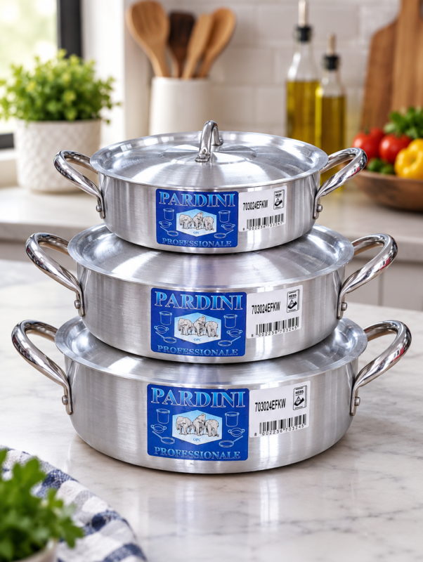 Stack of 3 Pardini professional shallow aluminium casserole sufurias with lids manufactured by Kaluworks on a kitchen counterStack of 3 Pardini professional shallow aluminium casserole sufurias with lids manufactured by Kaluworks on a kitchen counter