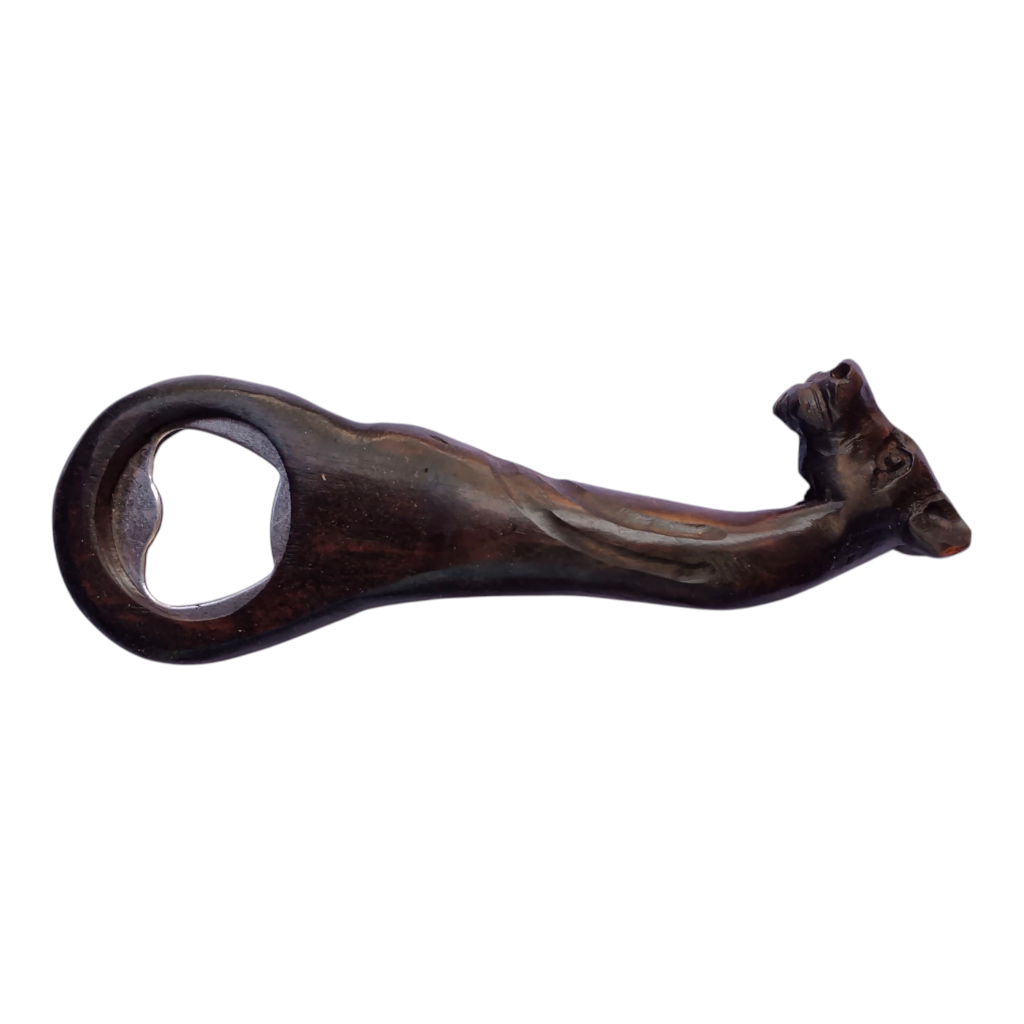 Hand-carved Kenyan ebony wood bottle opener shaped like a giraffe, crafted by Kibera artisans with an integrated metal opener loop.